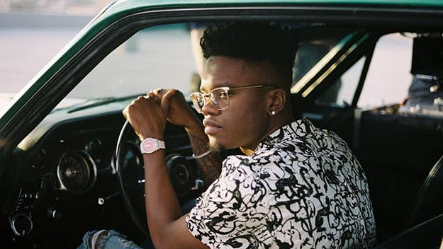 As he rides around the city and dances in an empty parking lot to his latest single, 24-year-old rapper Nebu Kiniza has a smile that never leaves his face. Over breezy production, Nebu delivers melodic, carefree bars perfect for late-night summer drives.