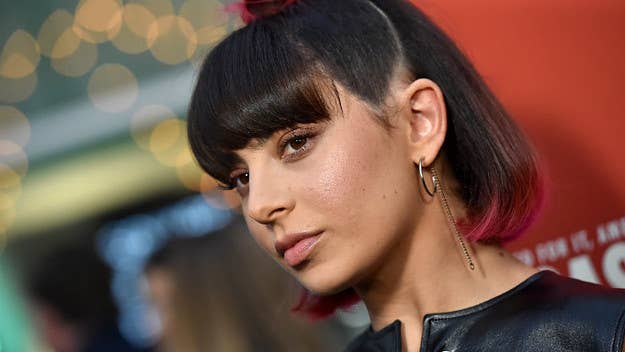 Charli XCX, master of futuristic pop, is back with another new one. This time, she's linked up with Troye Sivan for the Britney-referencing "1999."