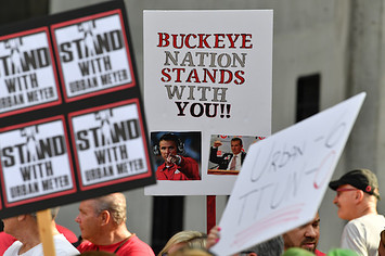 Supporters of Ohio State head football coach Urban Meyer.