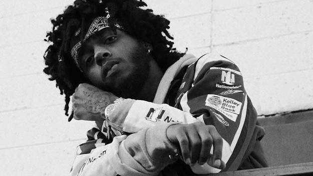 The surprising clip shows 6LACK battling as Thug watches on the streets of Atlanta.