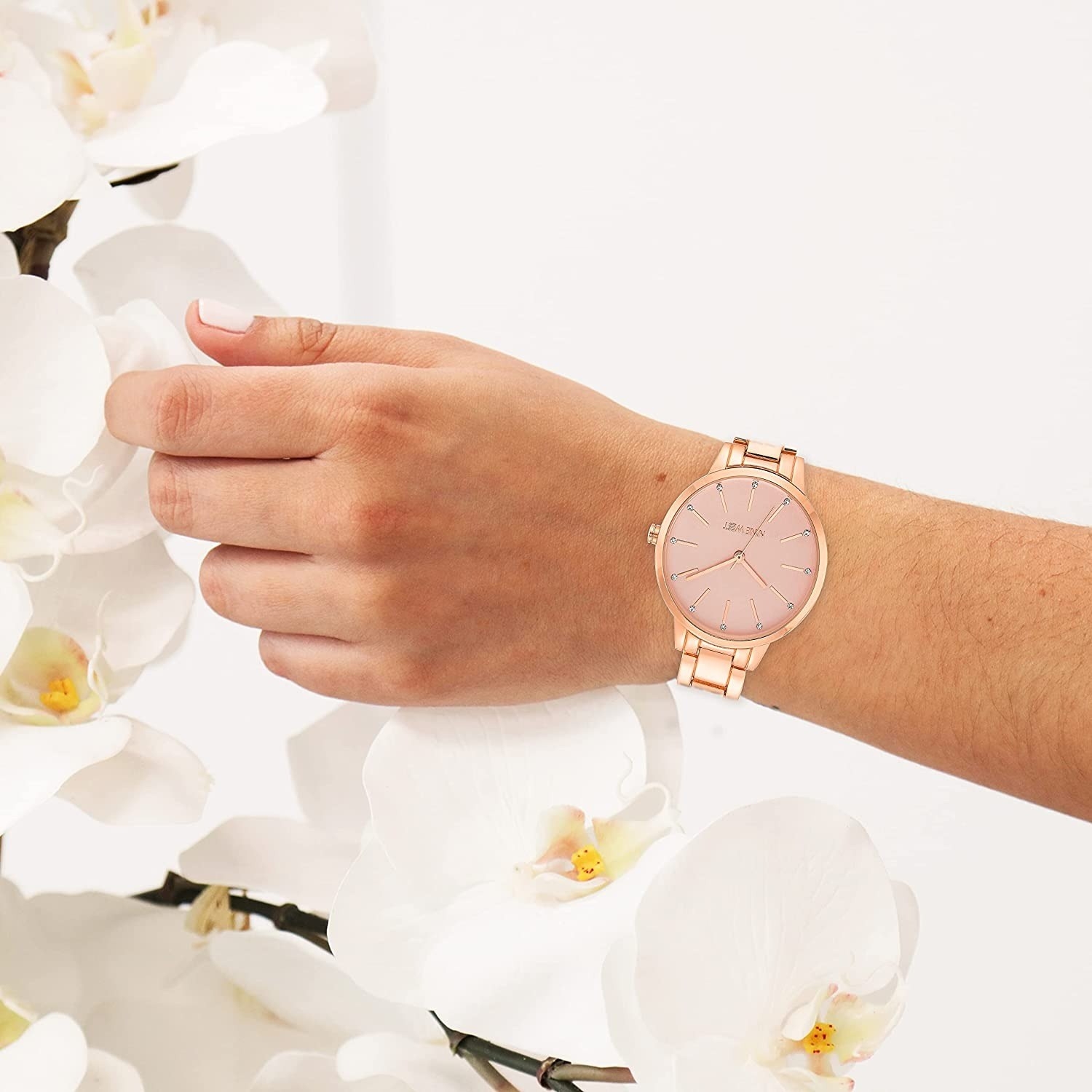 reloj de pulsera Nine West color oro rosa con detalles de vidrio para mujer