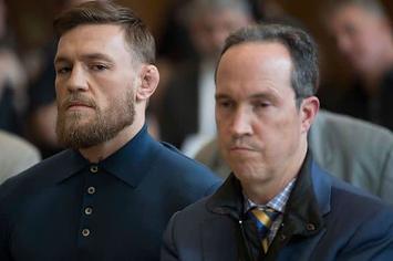 Conor McGregor (L) stands with his lawyer Jim Walden.