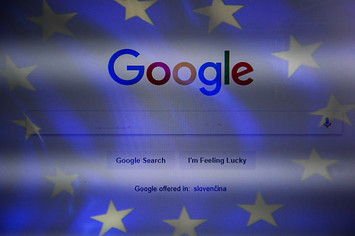 Google search engine overlayed with the European Union flag.