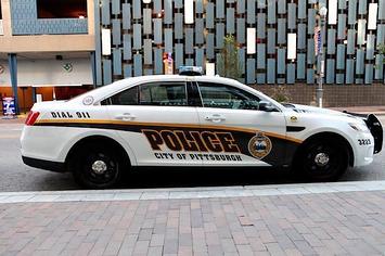 Pittsburgh Police vehicle sits on a downtown street in Pittsburgh, Pennsylvania.