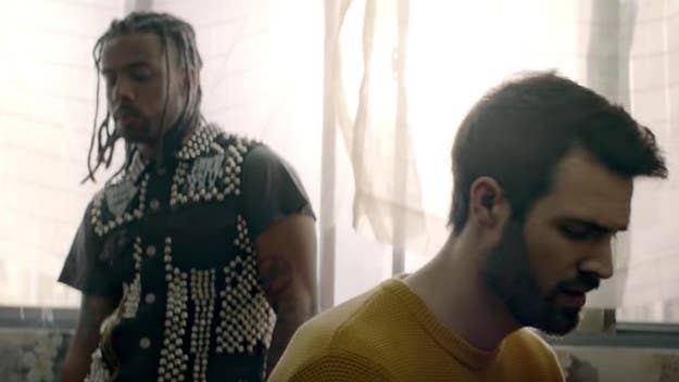 Emmit Fenn is joined by Vic Mensa in the powerful new video for their collab "Pouring Rain," directed by FuseHouse. Previously, Fenn has collaborated with Billie Eilish and more.