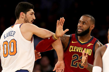 Enes Kanter #00 of the New York Knicks and LeBron James #23 of the Cleveland Cavaliers.