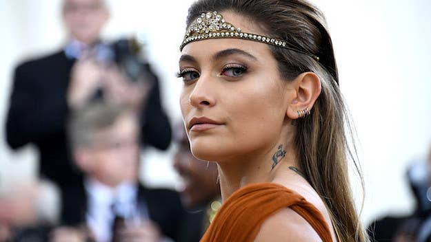 While Paris echoed her cousin's prideful and congratulatory sentiments on aunt Janet's achievements, she was also absent and publicly alluded to family turmoil.
