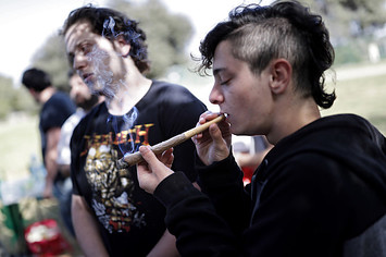 People smoking weed at a marijuana rally