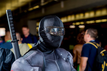 A fan cosplays as Snake Eyes from G.I. Joe.
