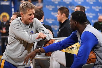 Steve Kerr, head coach of the Golden State Warriors with Draymond Green.