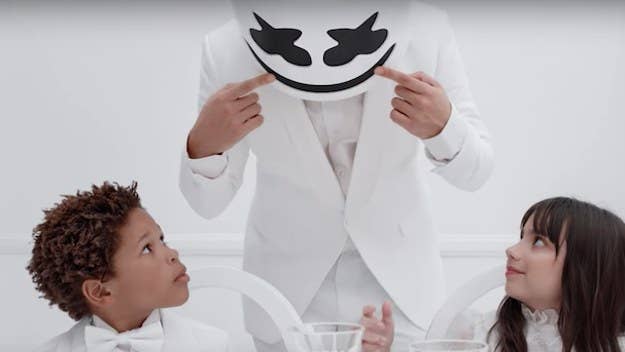 The three musicians are dressed in all white for the "You Can Cry" video.