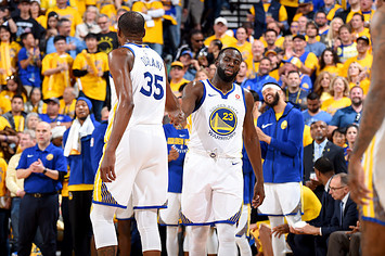 Kevin Durant #35 and Draymond Green #23.