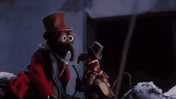 rizzo and Gonzo flying away on a rope in The Muppets Christmas Carol