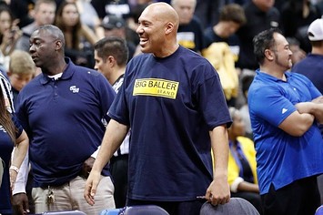 LaVar Ball wears a Big Baller Brand T shirt at a UCLA game.