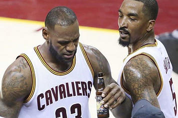 LeBron James pretends to sip a beer after he's fouled against the Raptors.