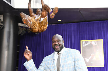 Former Lakers center Shaquille O'Neal poses at statue unveiling ceremony at Staples Center.