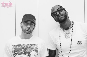 Eminem and 2 Chainz take a photo together.