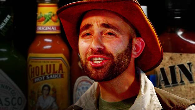 YouTube star Coyote Peterson takes on the Hot Ones challenge with host Sean Evans. 