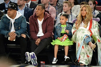 Jay Z, Blue Ivy Carter and Beyoncé Knowles attend the 66th NBA All Star Game