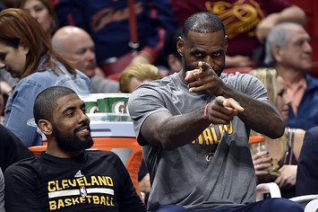 LeBron James points to camera.