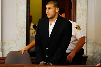 Aaron Hernandez arrives at a court hearing in 2013.