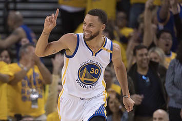 Steph Curry acknowledges teammate on the court.
