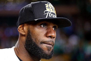 LeBron James wears championship hat after Eastern Conference Finals victory.
