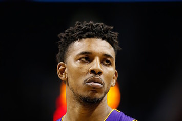 Nick Young looks on as Twitter reminds him of how he used to slander Warriors fans.