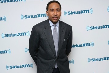 Stephen A. Smith poses on the red carpet.