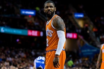 Kyrie Irving reacts to a call on the court.