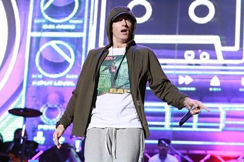 Eminem performs in 2014.
