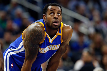 Andre Iguodala puts his hands on his knees during game.