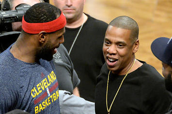 LeBron James talking to Jay Z.