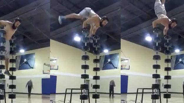 A guy doing handstand pushups on a stack of dumbbells is just the latest person to pull off a crazy stunt (and film it) at the gym.