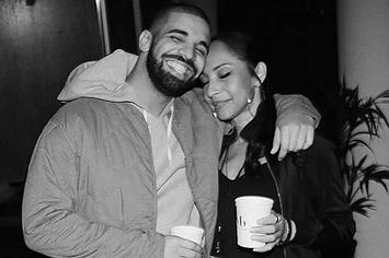 Drake smiles for an Instagram picture with Sade.