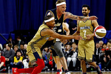 Romeo Miller battles with Jason Williams for a loose ball over All Star weekend.