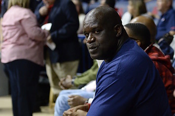 Shaq caught by camera while attending game.