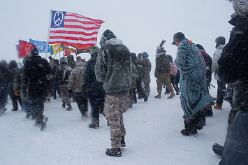 Hundreds of United States military veterans vow to defend the Standing Rock protest camp
