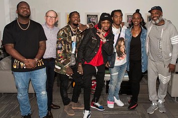 The members of Migos and their Quality Control team celebrate signing with Motown.