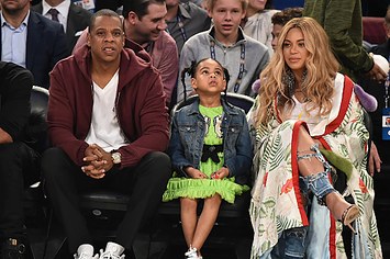 Jay Z, Blue Ivy Carter and Beyonce Knowles attend the 66th NBA All Star Game