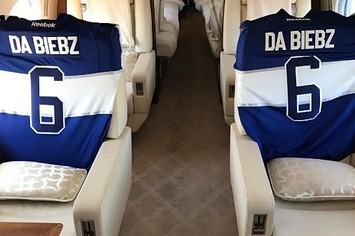 Justin Bieber shows off his custom Maple Leafs jerseys.
