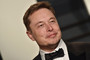 Elon Musk arrives at the 2017 Vanity Fair Oscar Party
