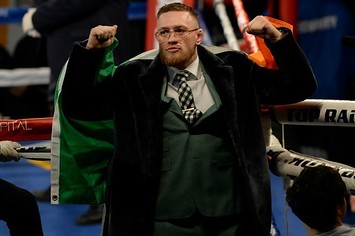 Conor McGregor attends a boxing match.