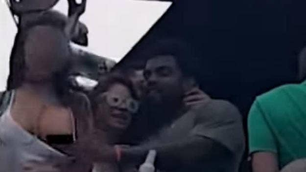 Ezekiel Elliott got caught on camera pulling down a woman's shirt at a St. Patrick's Day parade.