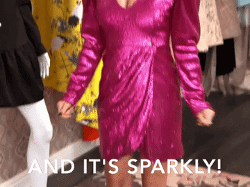 Tanya screaming in a sparkly dress