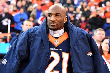 Aqib Talib watches game from the sidelines.