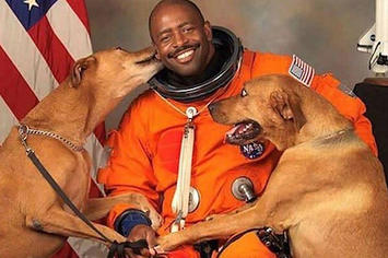 Astronaut Leland Martin with his dogs.