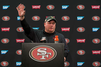 Chip Kelly waves goodbye to the press after his final press conference as the 49ers coach.