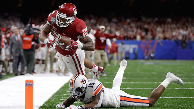 Oklahoma players celebrated by fake-punching Joe Mixon