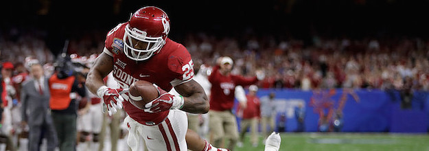 Oklahoma players celebrated by fake-punching Joe Mixon